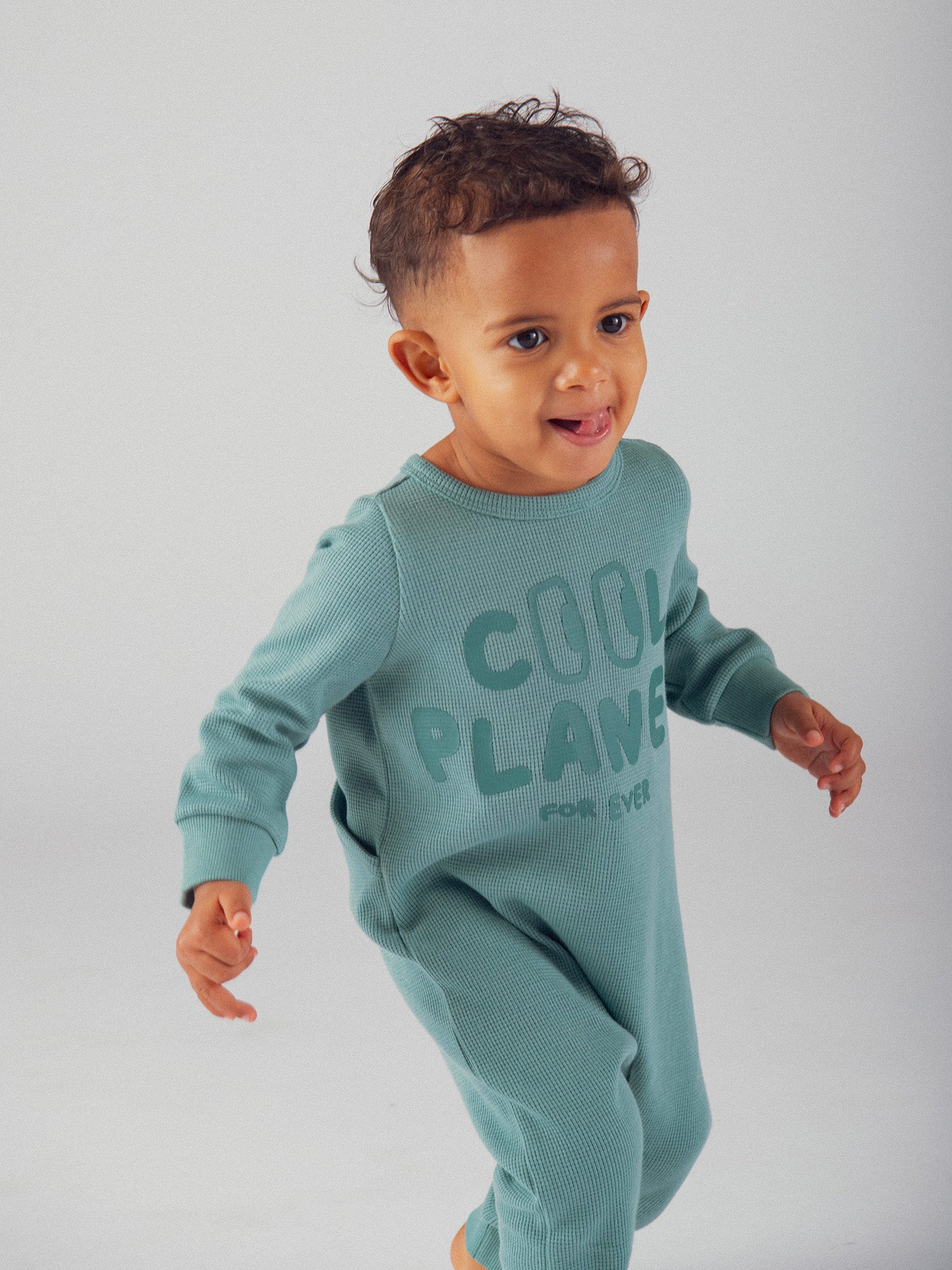Grenouillère vert "Good Vibes" en maille gaufrée pour bébé garçon