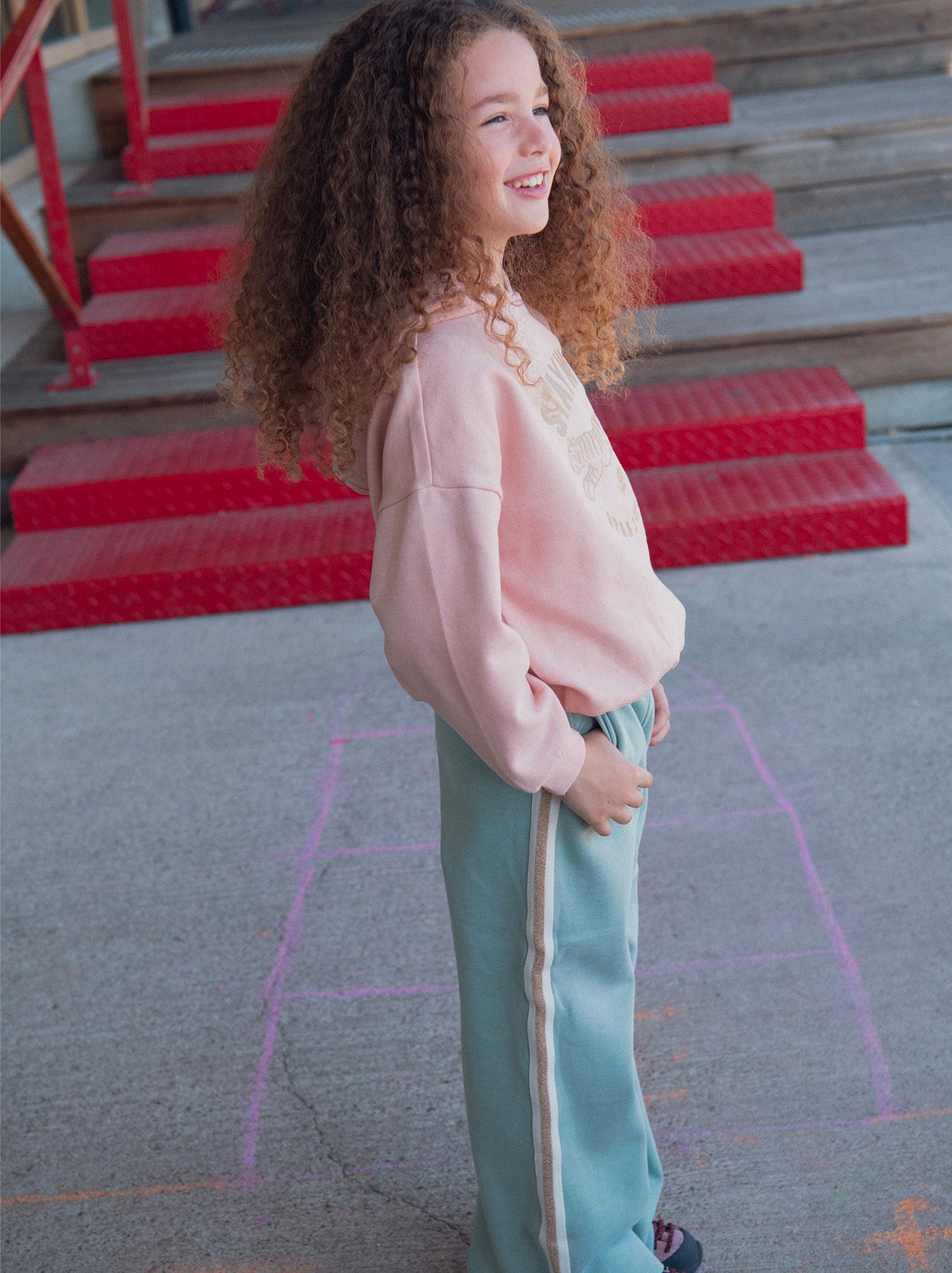 Grüne Sweatpants mit fantasievollen Details und Taschen für Mädchen