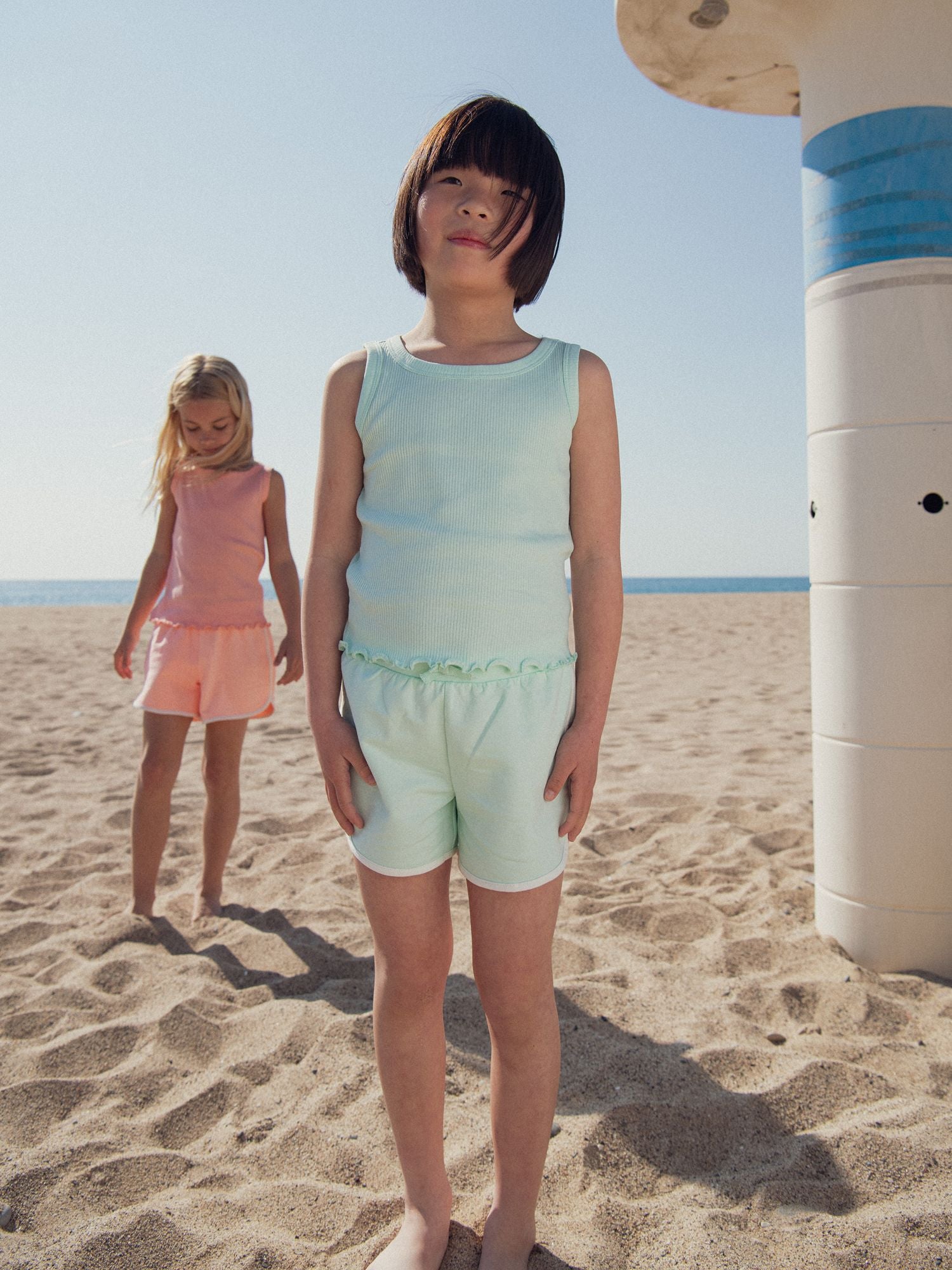 Short bleu clair taille élastiquée pour fille