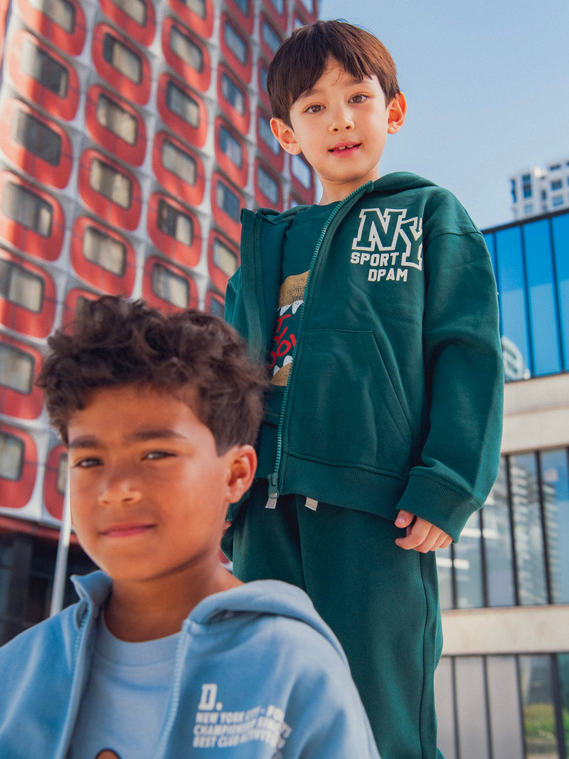 Grünes Joggingoberteil für Jungen