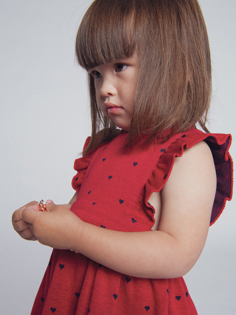 Rotes Kleid mit Herzen aus Strick für Mädchen