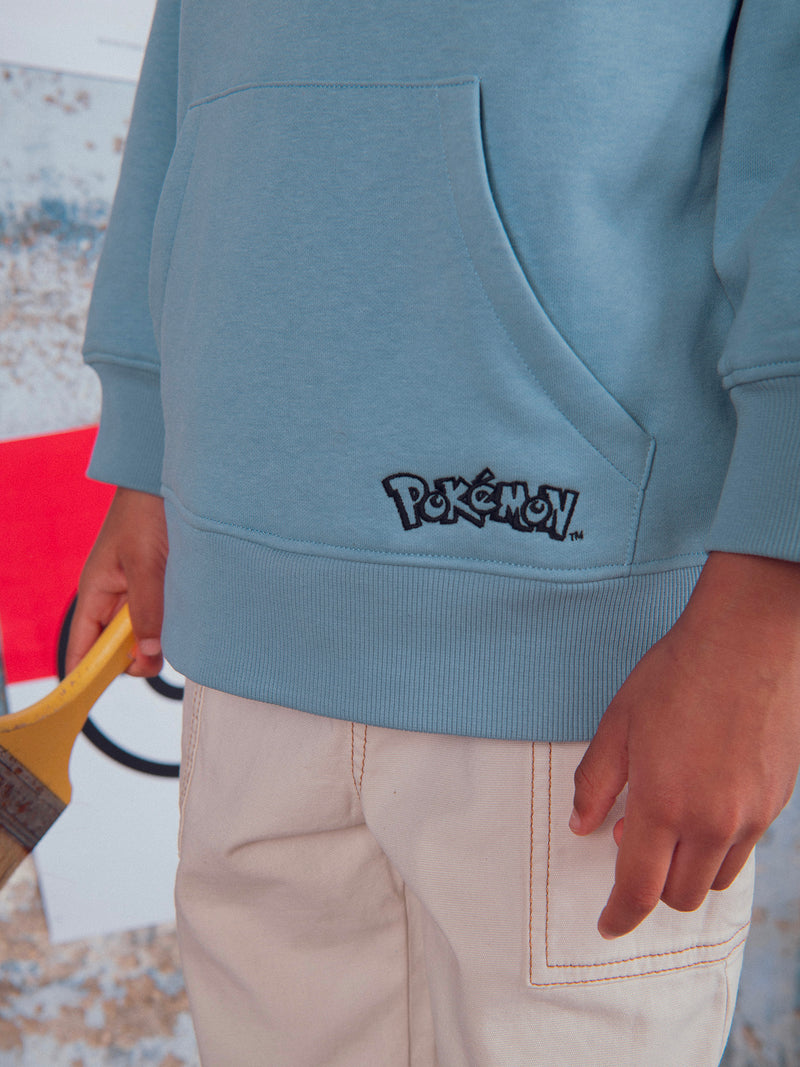 Blauer Sweatshirt mit Pokémon Mewtwo Abzeichen