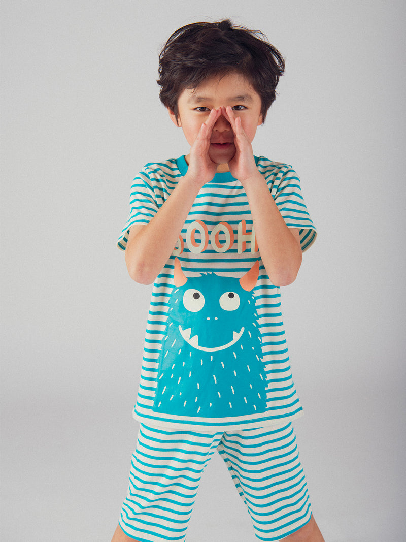 Kurzes phosphoreszierendes Pyjama mit Streifen und "Lustigem Monster"-Motiv für Jungen