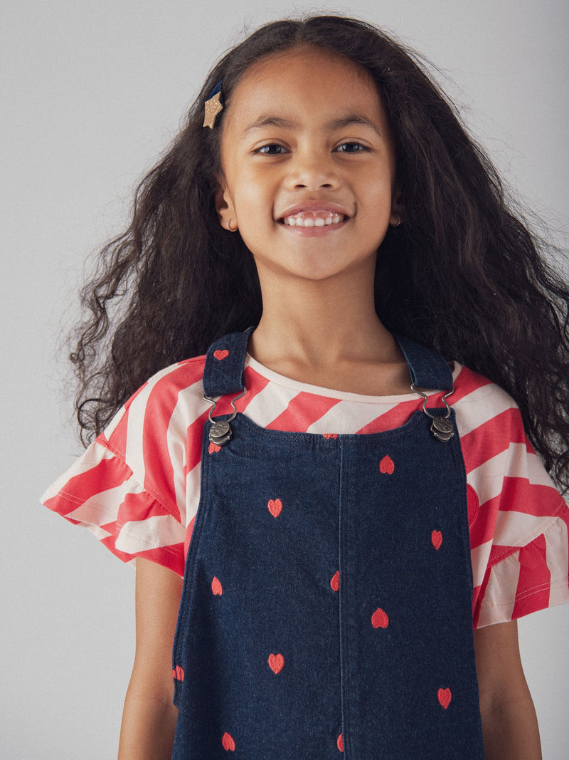 Robe-salopette bleu en denim et broderies cœur pour fille
