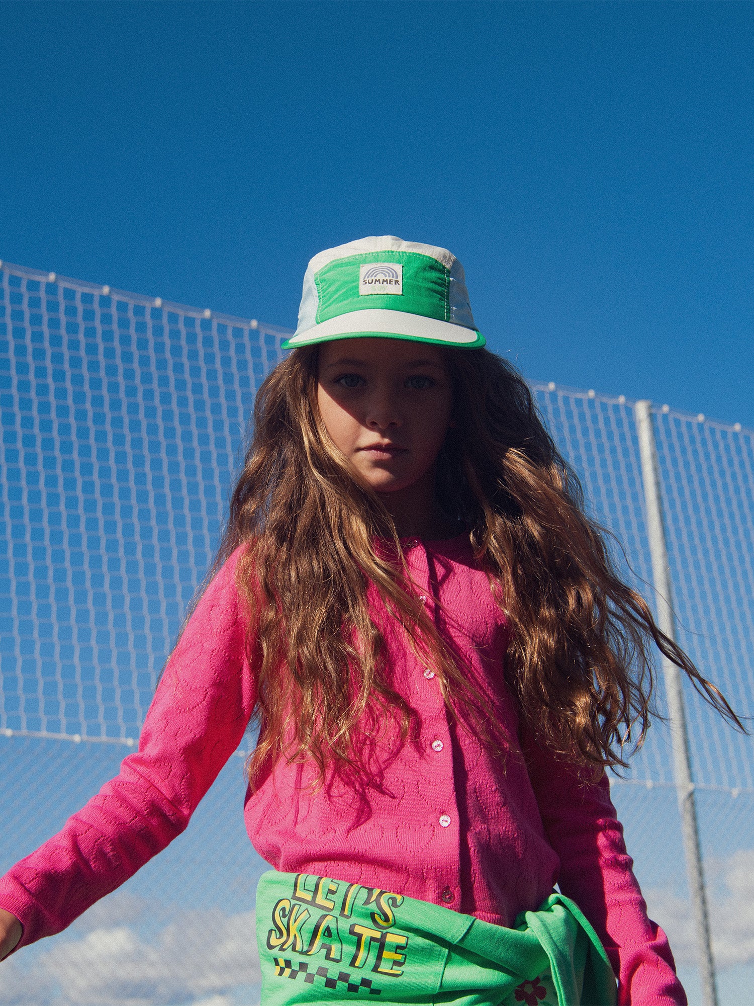 Cardigan rose en pointelle coeur pour fille