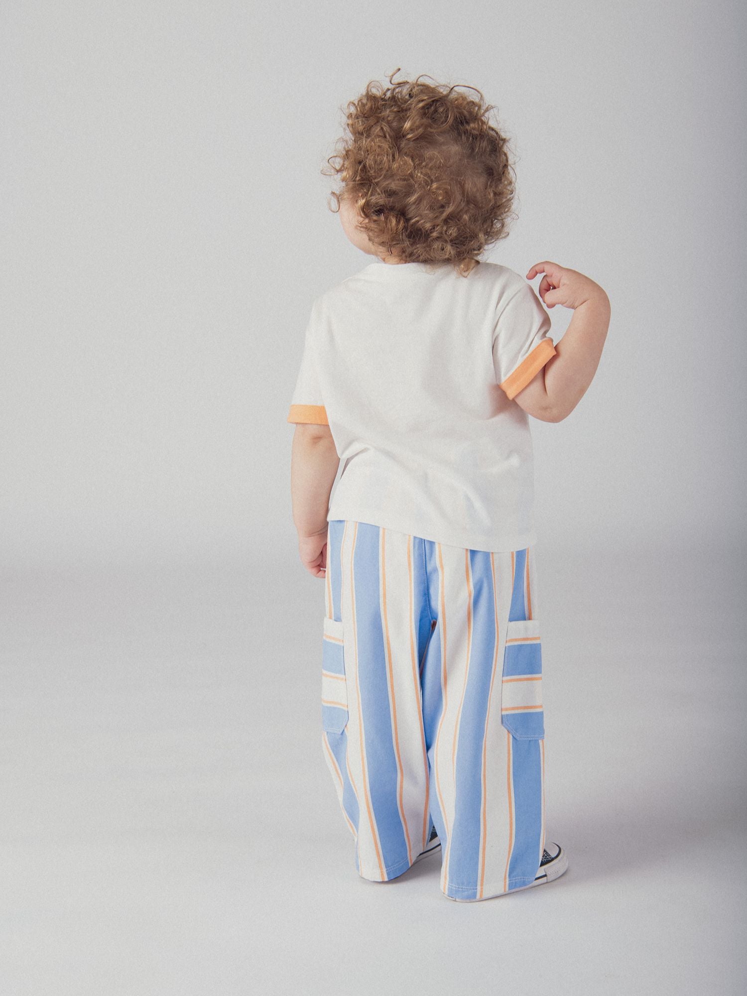 Pantalon rayé bleu et pêche pour bébé garçon
