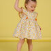 Baby Mädchen weißes und gelbes Kleid