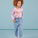 Helle Denim-Jeans mit Tupfen für ein Kind Mädchen